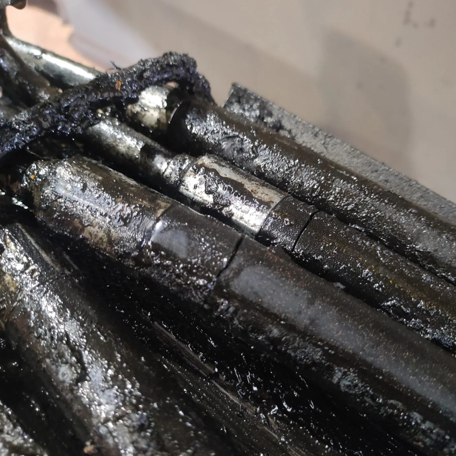 Hydraulic hose bank - worn, greasy and overdue for replacement